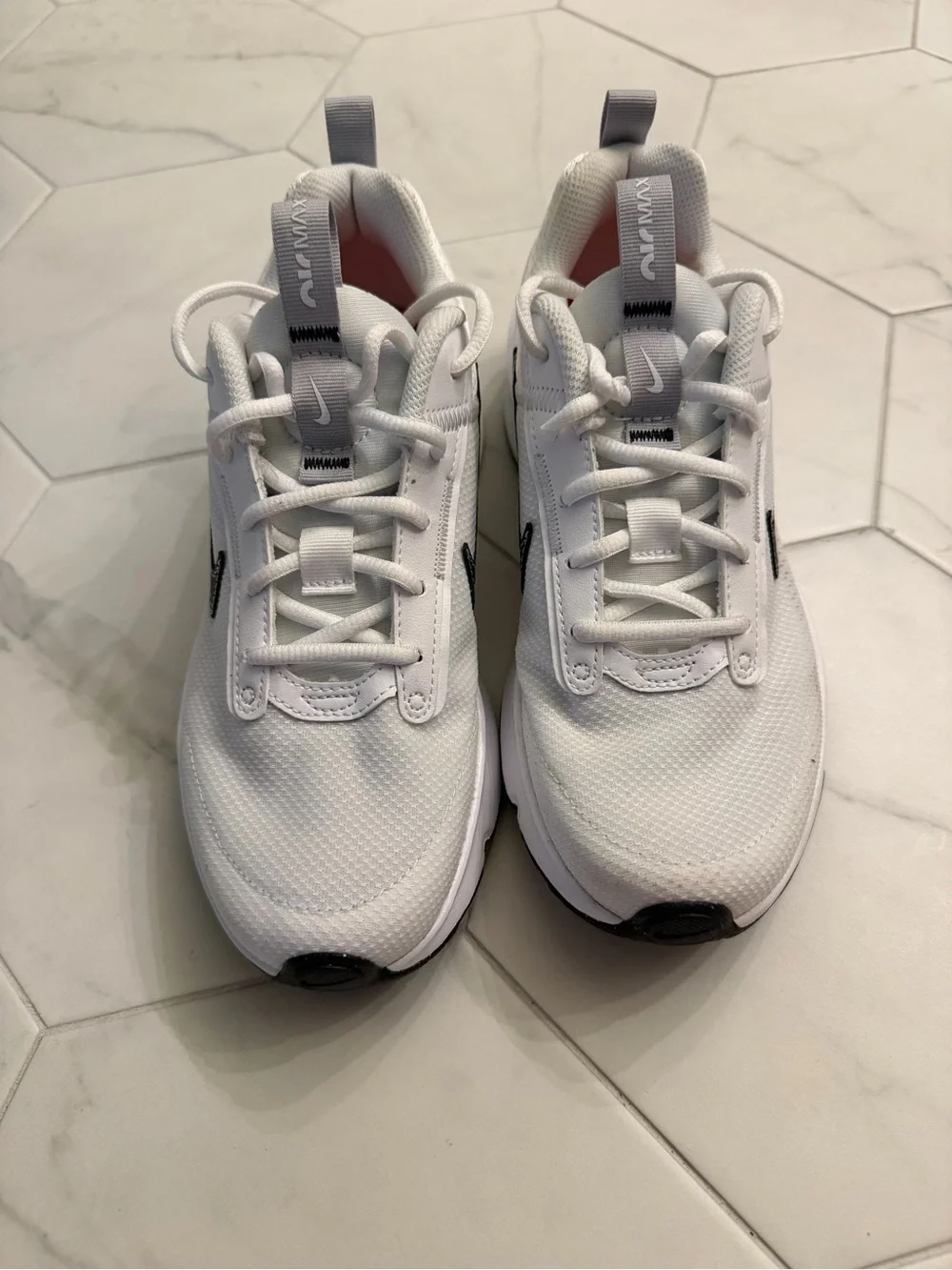 Nike White Sneakers with Black Swoosh and Gray Pull Tabs